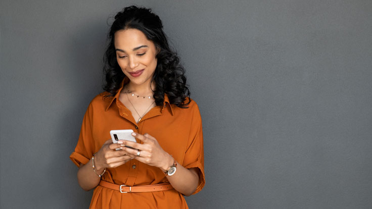 Woman looking at her mobile phone